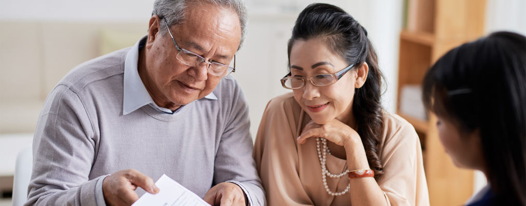 Older couple looking at paperwork