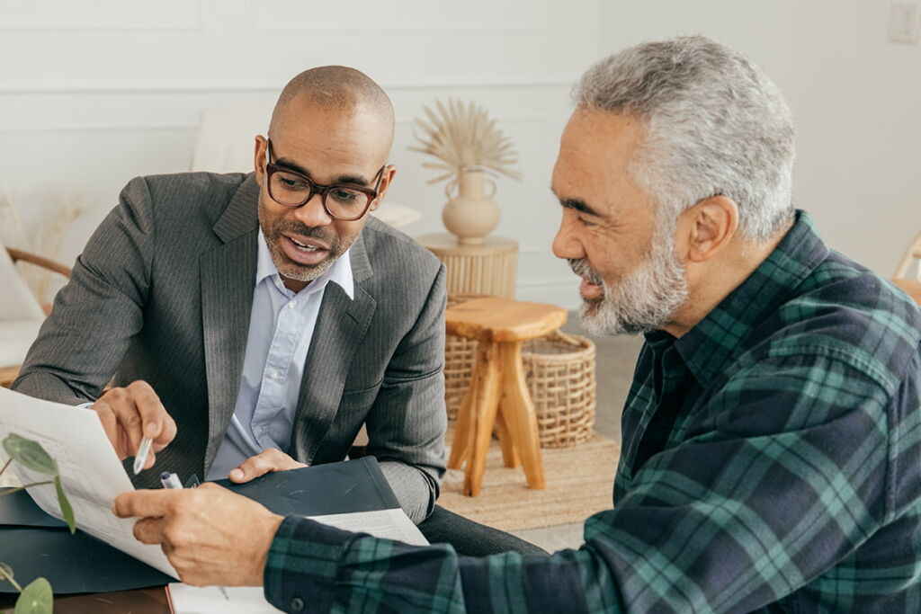 Insurance agent reviewing health coverage options with a member